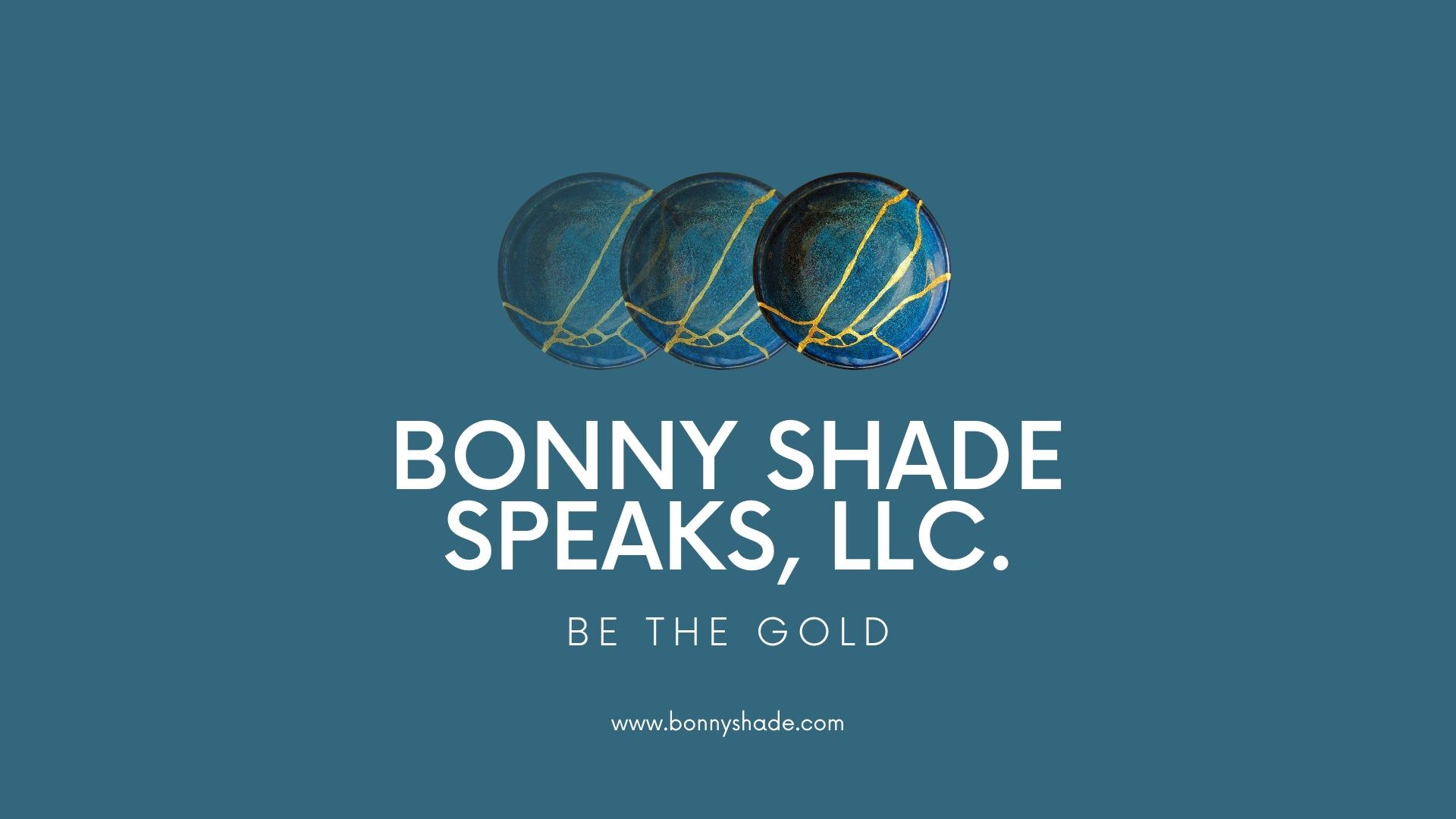 Logo: Three spheres with gold lines, 