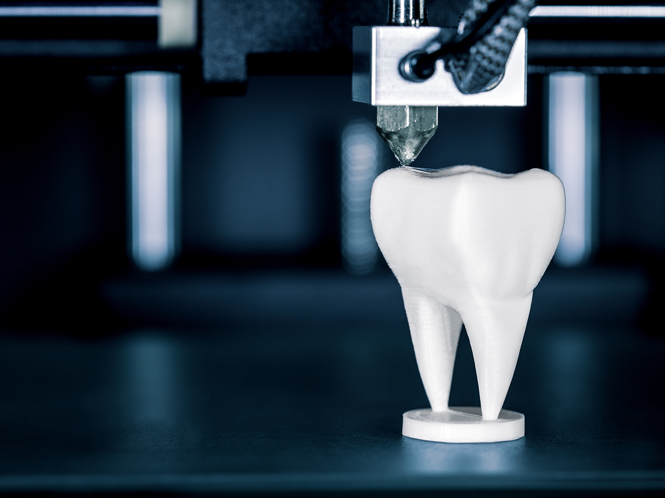 3d printed tooth being printed on a 3d printer