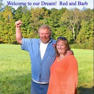 A man and woman standing in a field with the words welcome to our dream red and barb