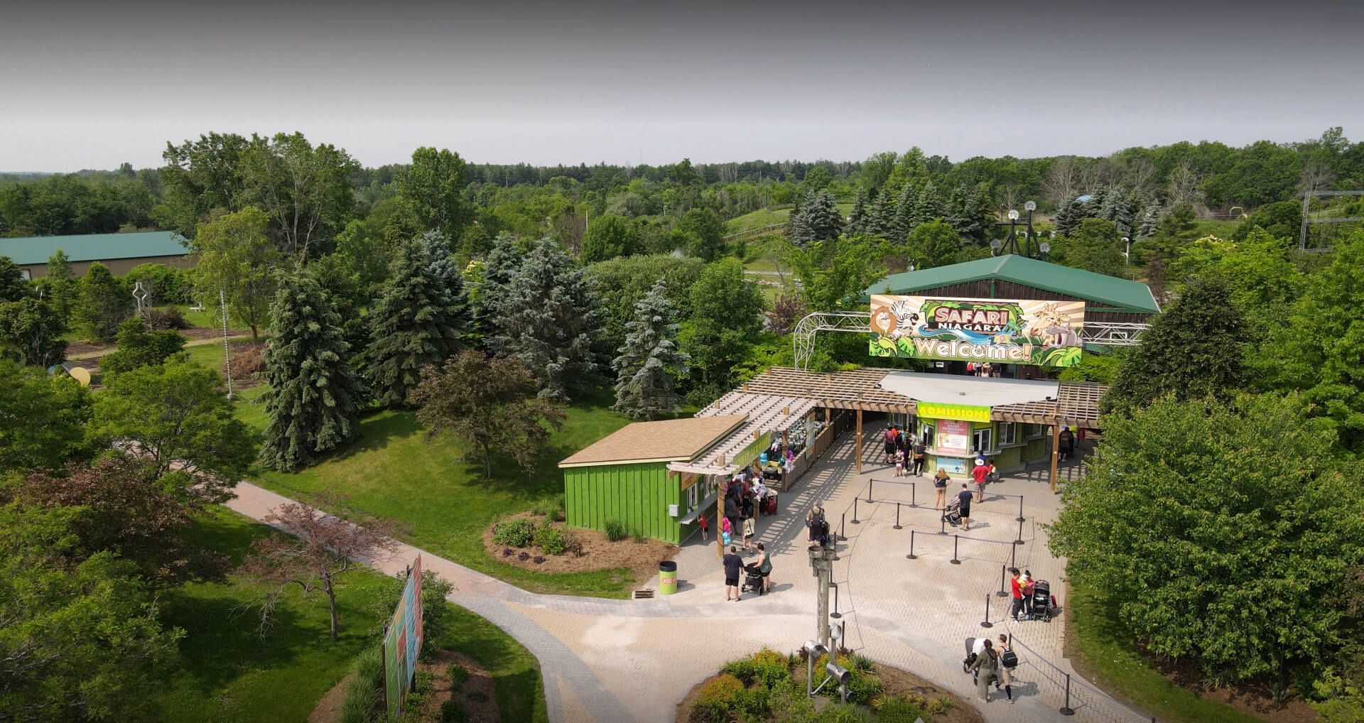 an aerial view of a niagara region zoo with lots of trees and buildings