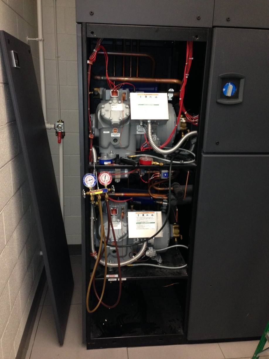 The inside of an air conditioner with the door open from AFA Service