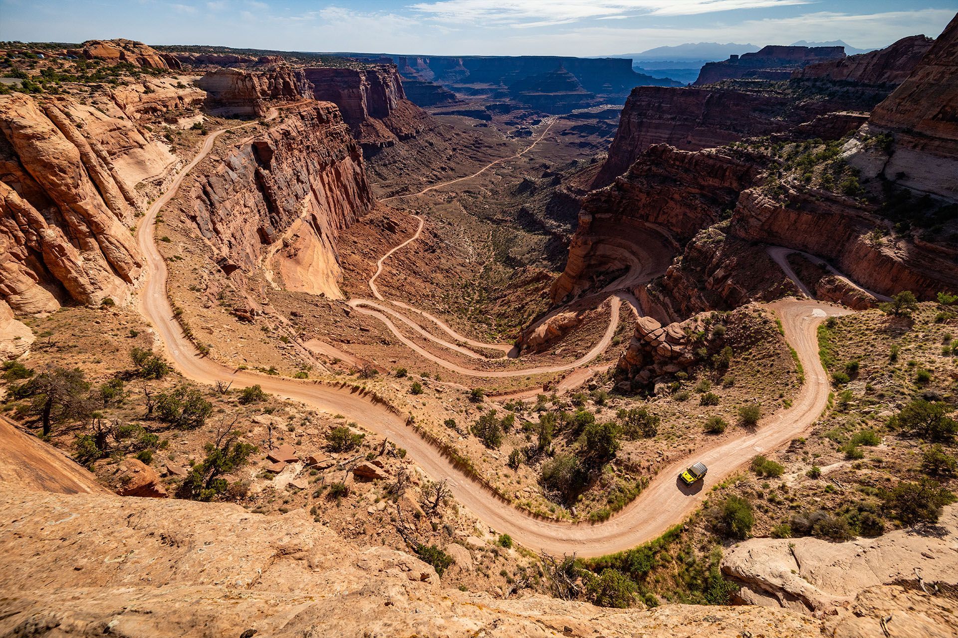 A Jeep navigates Shafer Trail in Moab