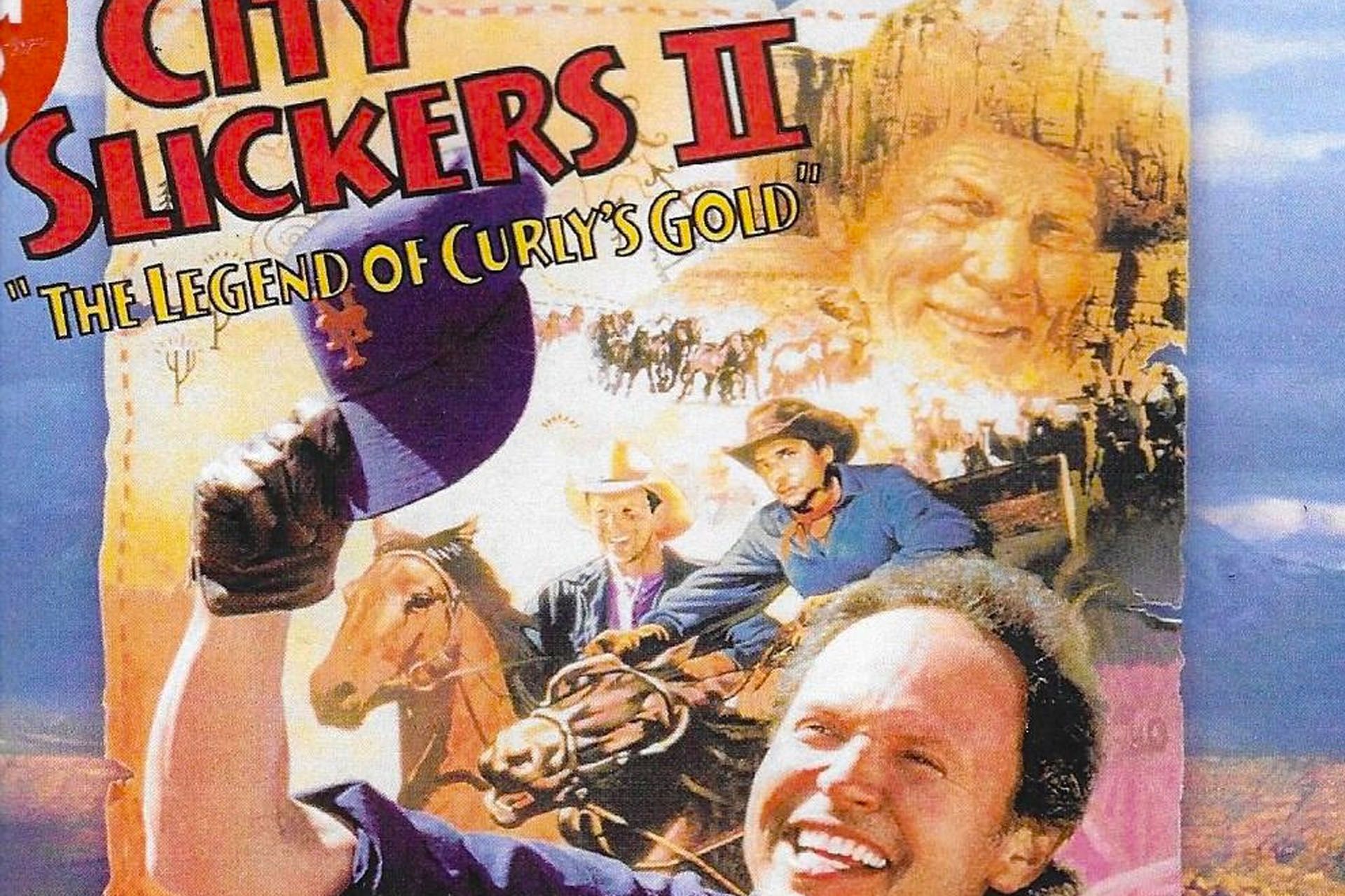City Slickers II movie poster: cowboys, gold, smiling Billy Crystal.