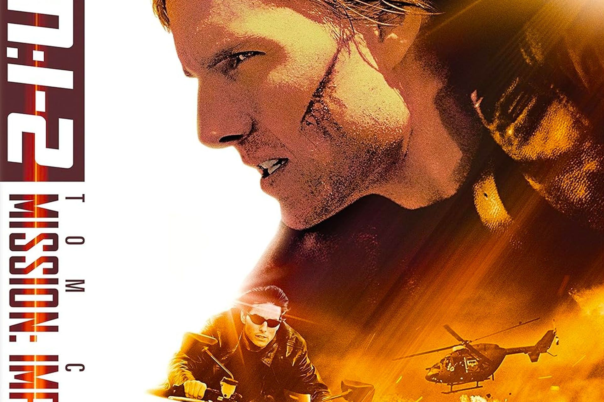 Tom Cruise in Mission: Impossible 2 poster. Close up of his face, and lower half with a helicopter.