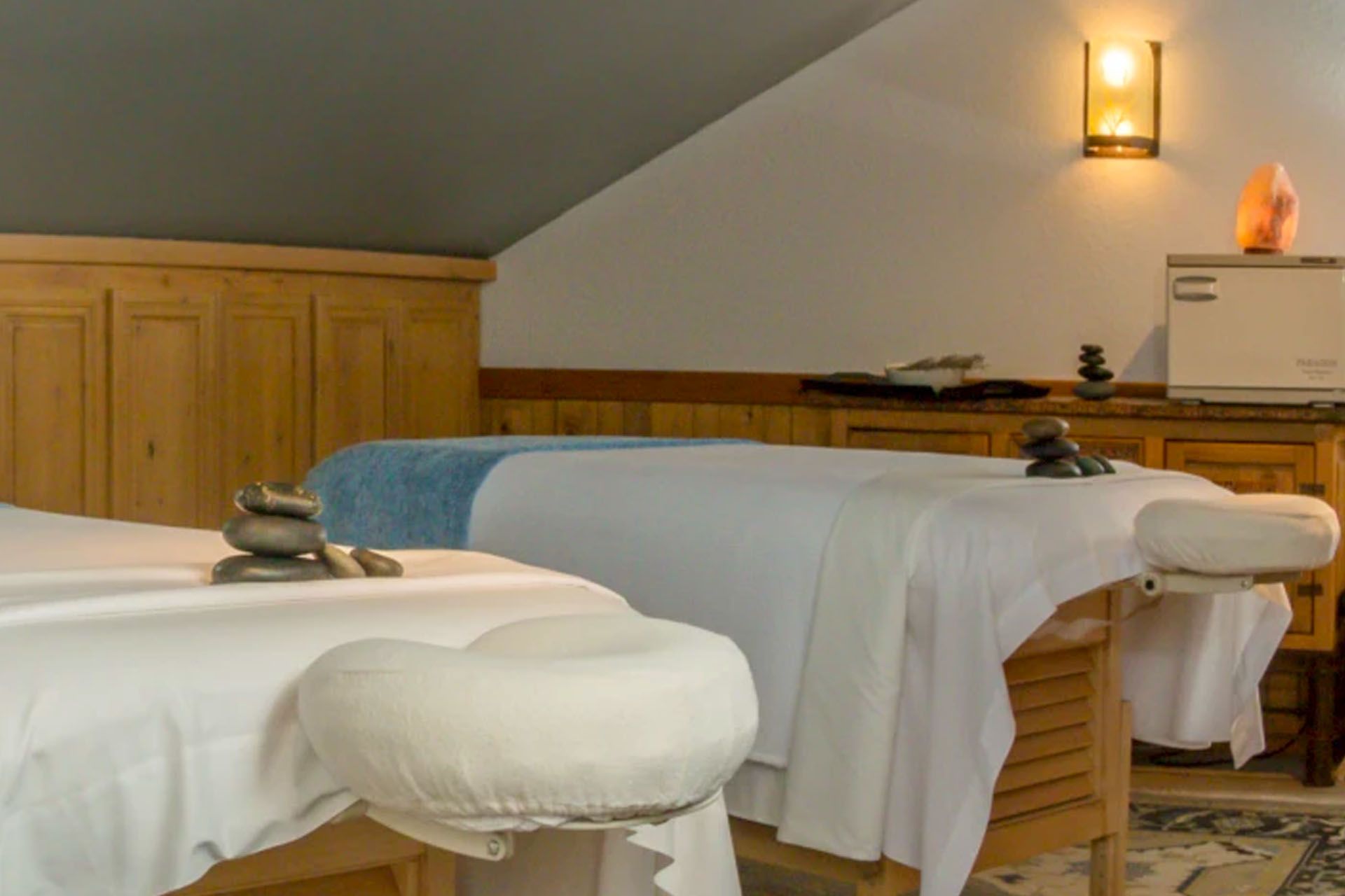 Two massage beds side by side at the Spa at Sorrel River Ranch.