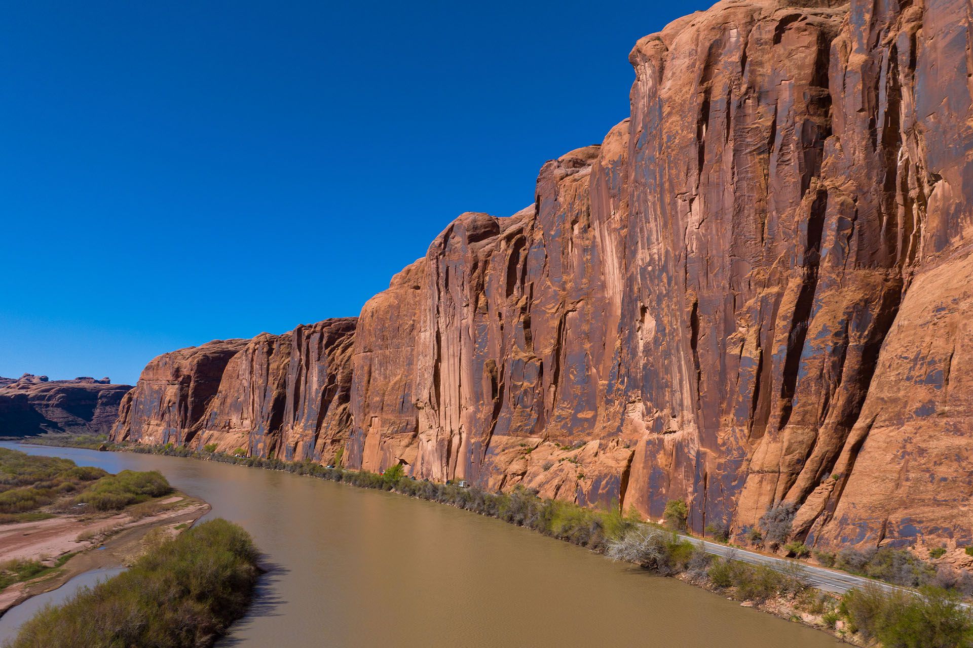 Sheer cliffs of Wall Street with Potash Road winding below.