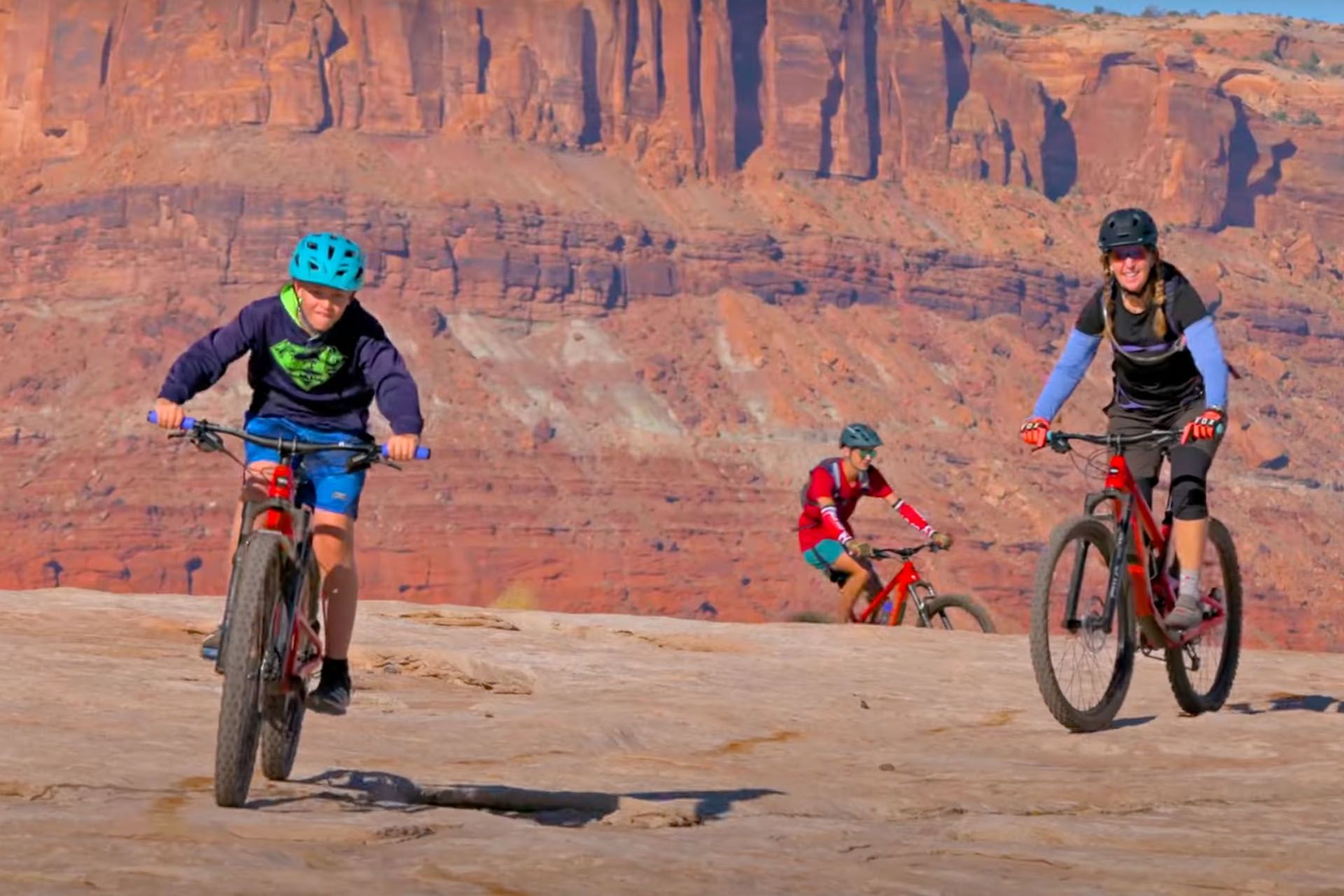 Mountain biking the easy slickrock trails or Courthouse Loop at the Brands Trails area.