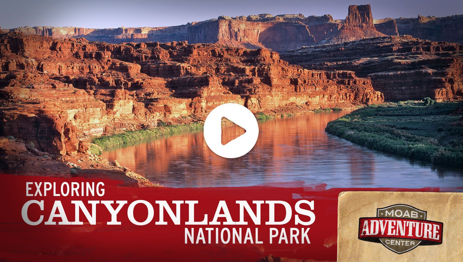 Canyonlands National Park landscape with a river and red rock cliffs. Video overlay indicates 