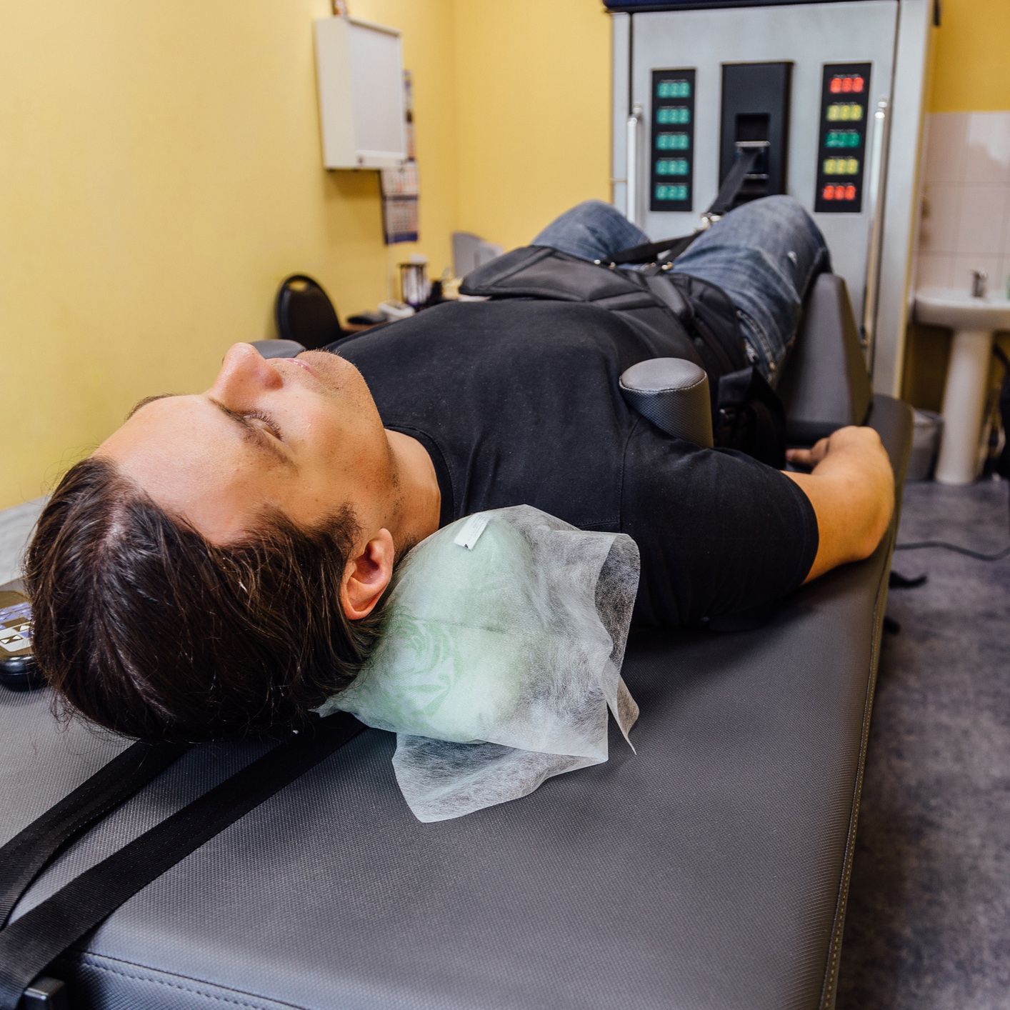 Man at Nonsurgical Spinal Decompression Procedure | Charleston, SC | Axis Chiropractic