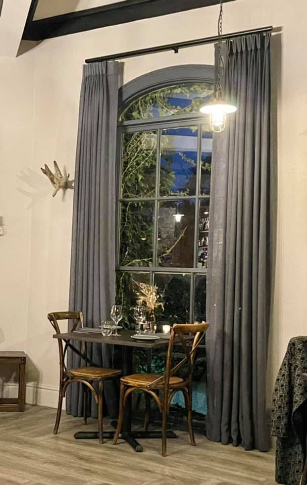 Pencil Pleated Curtains Installed At The Berida Hotel — Studio Curtains & Blinds in Mount Gravatt, QLD
