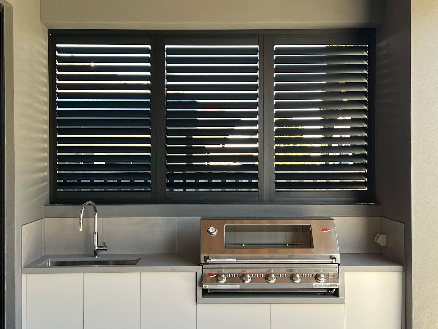 Black Satin Aluminium Shutters — Studio Curtains & Blinds in Mount Gravatt, QLD