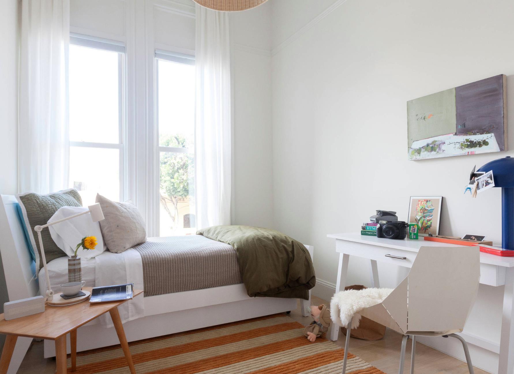 White Curtains In A Cozy Bedroom — Studio Curtains & Blinds in Mount Gravatt, QLD