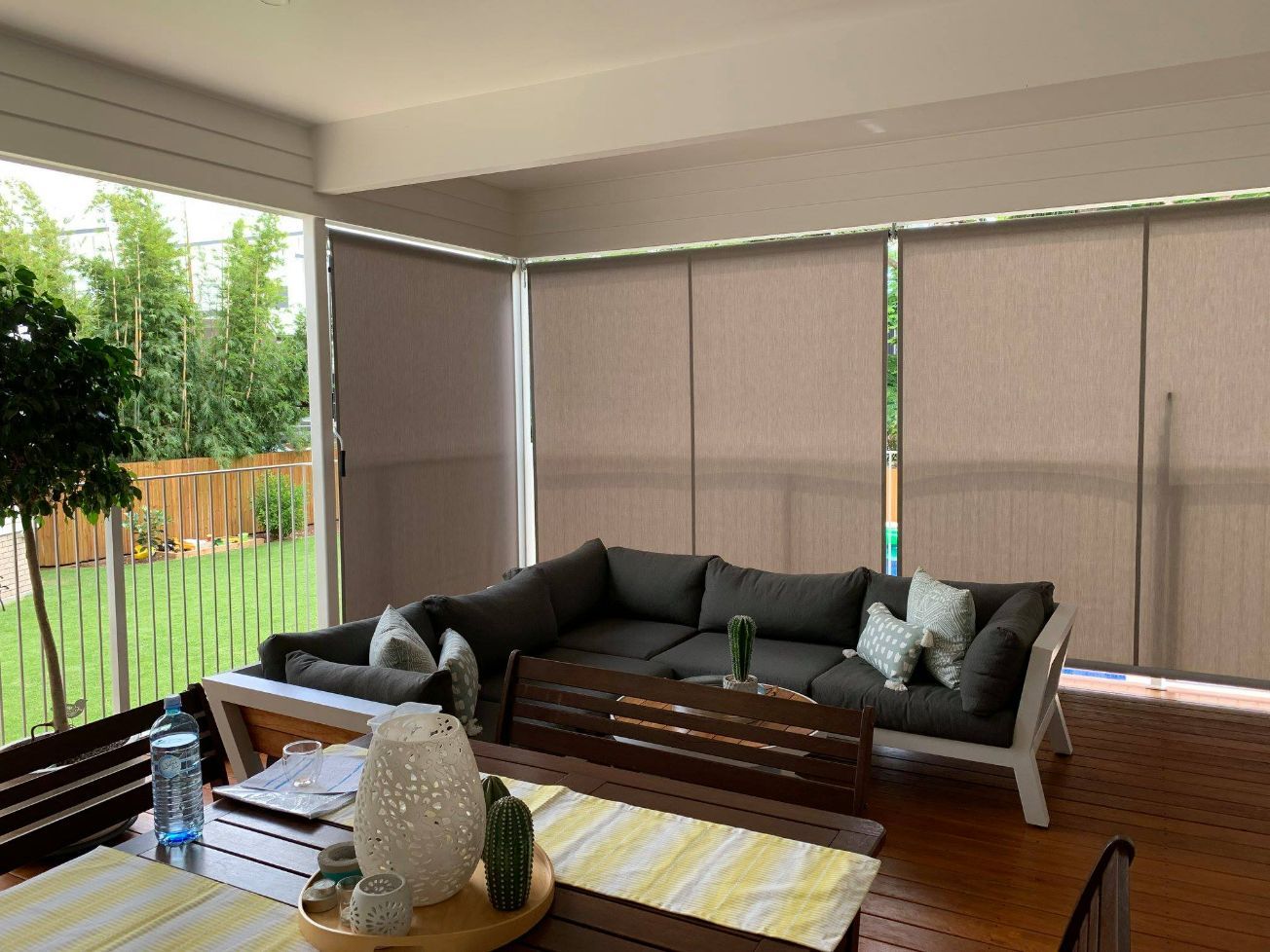 Cozy Sofa In A Veranda With Blockout Blinds — Studio Curtains & Blinds in Mount Gravatt, QLD