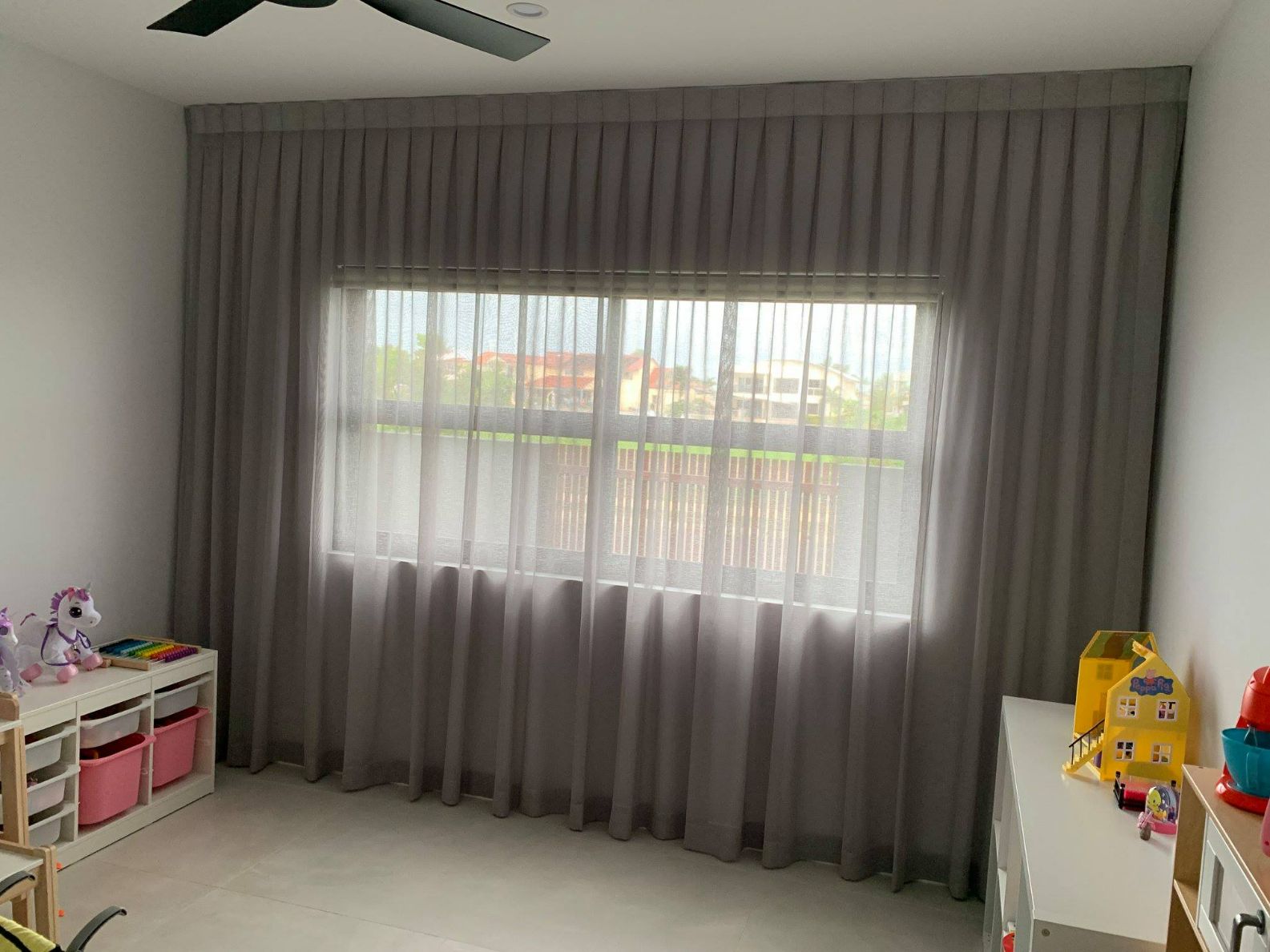 Kids Playroom With Inverted Pleat Curtains — Studio Curtains & Blinds in Mount Gravatt, QLD