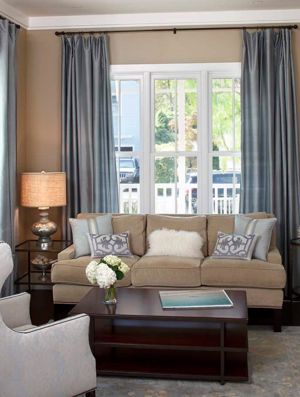 Living Room With Blue Blockout Curtains — Studio Curtains & Blinds in Mount Gravatt, QLD