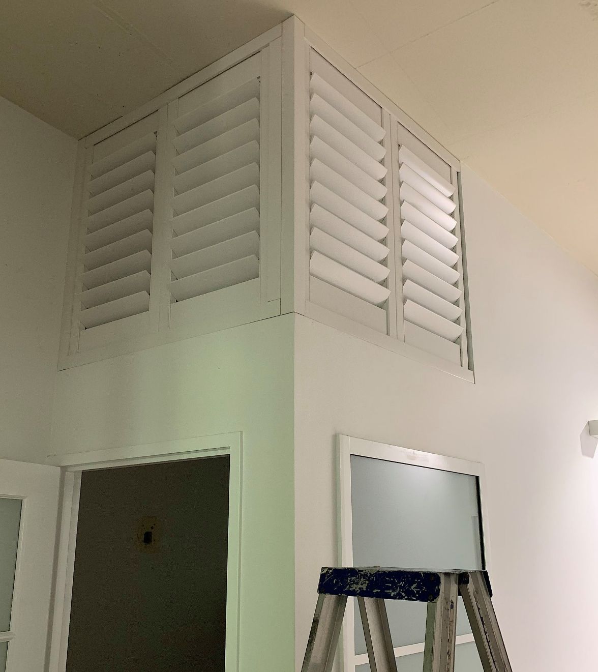 Window Shutters Near The Ceiling — Studio Curtains & Blinds in Mount Gravatt, QLD