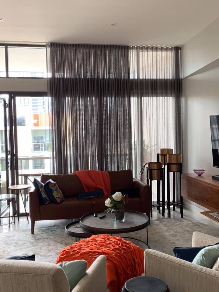 Brown & Orange Living Room With Sheer Curtains — Living Room Curtains in Brisbane, QLD