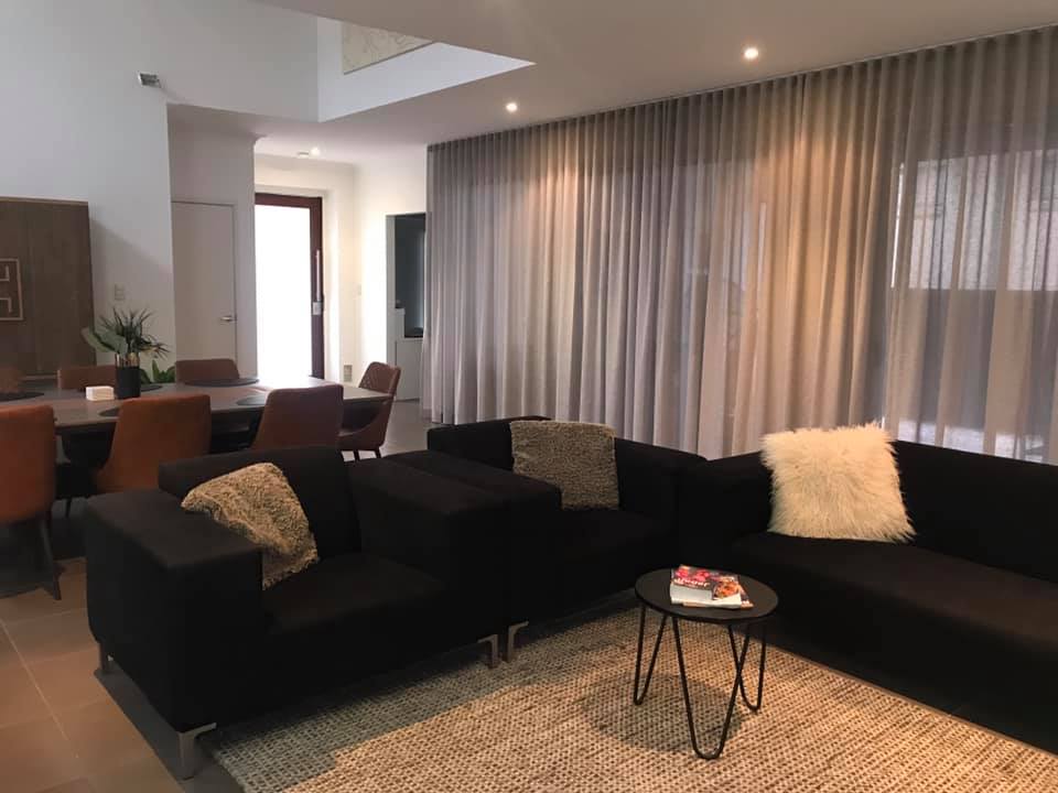 Living Room With S-fold Curtains — S-Fold Curtains in Brisbane, QLD