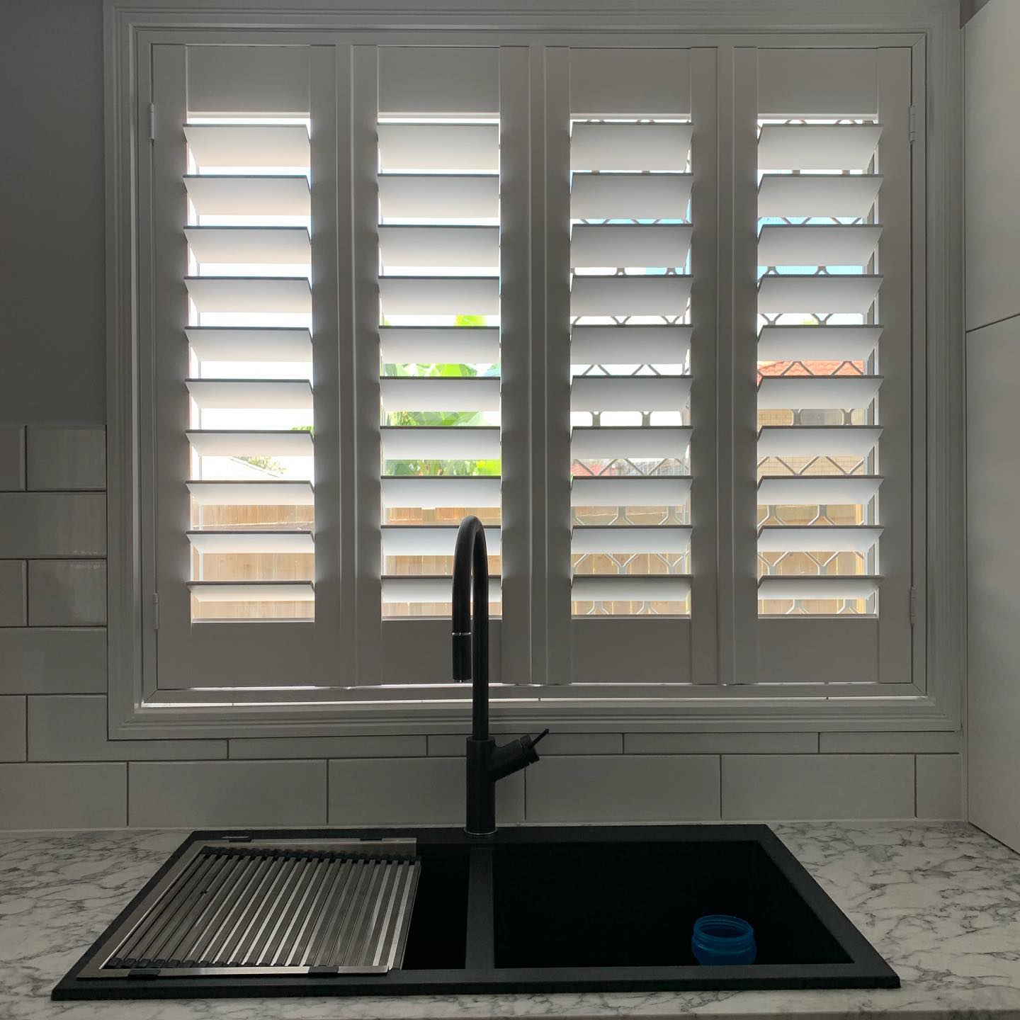 Double Hinged Shutters & Sink — Studio Curtains & Blinds in Mount Gravatt, QLD