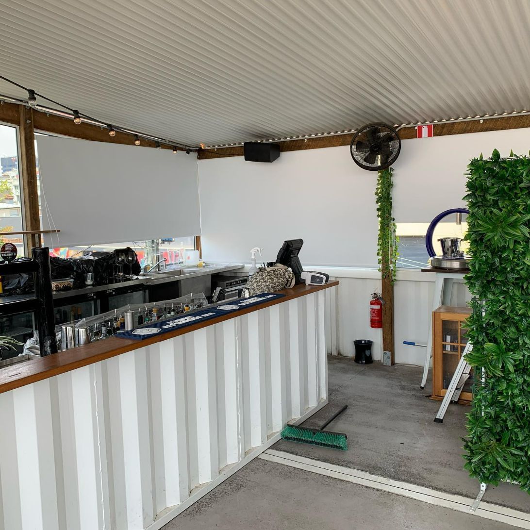 XCargo Bar With Blockout Blinds — Studio Curtains & Blinds in Mount Gravatt, QLD