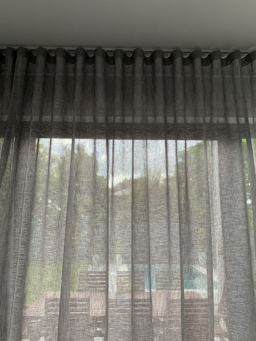 Black Sheer Curtains Installed On A Window — Studio Curtains & Blinds in Mount Gravatt, QLD