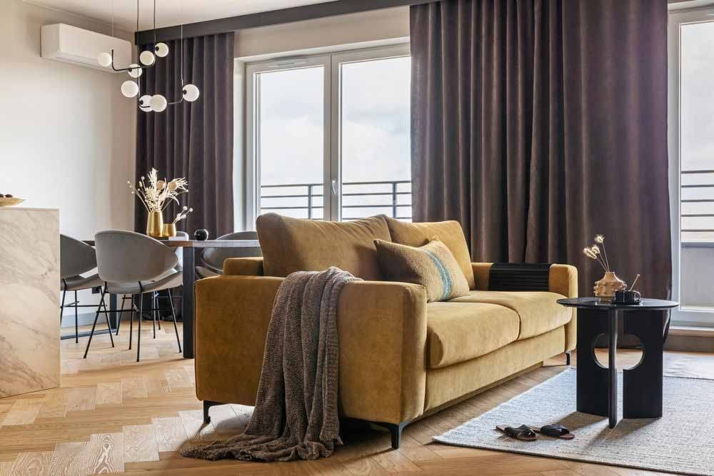 Big Elegant Room With Velvet Curtains On The Window — Window Coverings in Brisbane, QLD