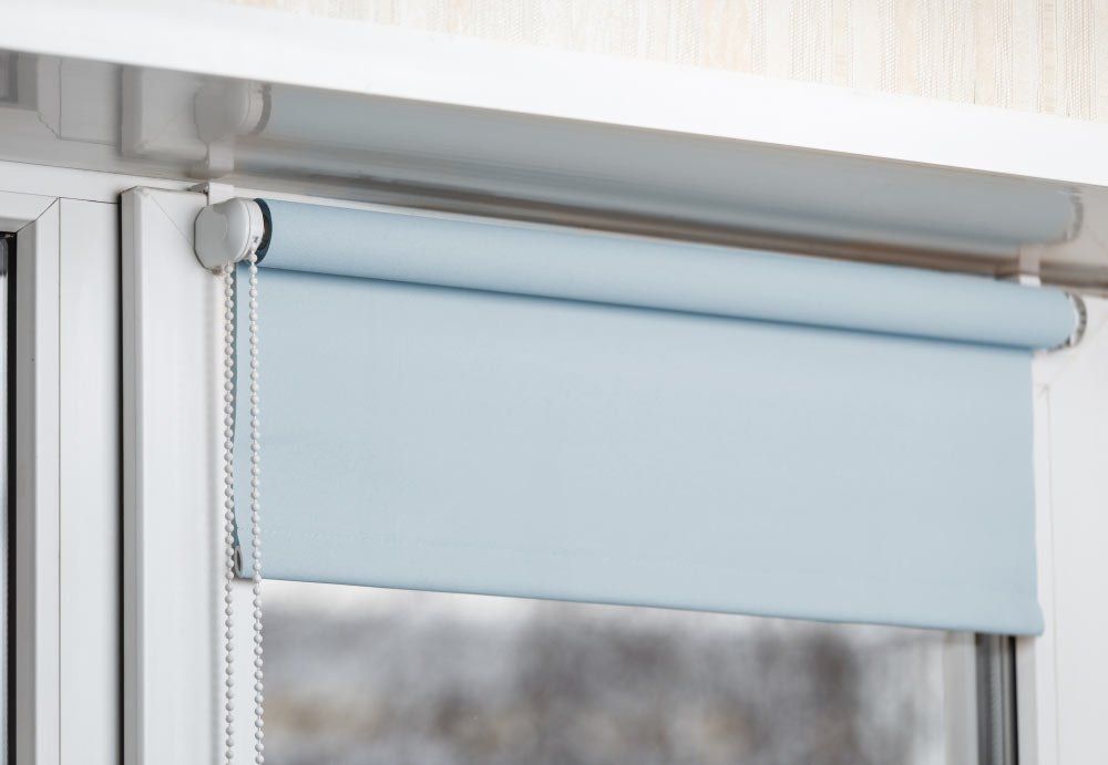 Blue Blockout Blinds On White Window — Studio Curtains & Blinds in Mount Gravatt, QLD