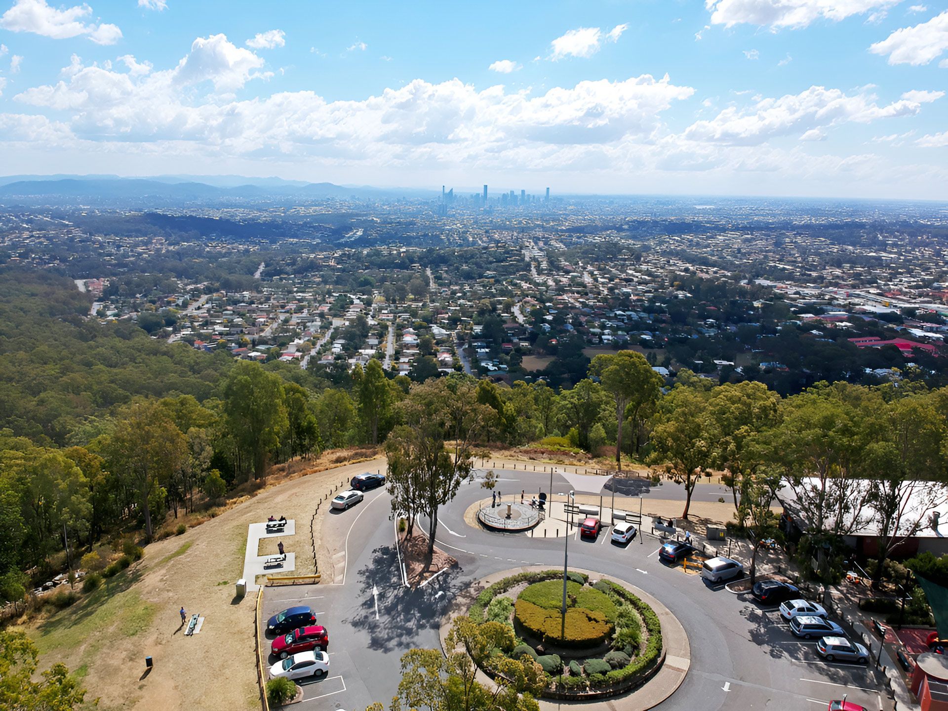 An Aerial View of a Parking Lot With a City in the Background — Studio Curtains & Blinds in Mount Gravatt, QLD