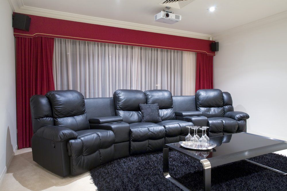 Home Theatre Room With Red & White Curtains — Studio Curtains & Blinds in Mount Gravatt, QLD