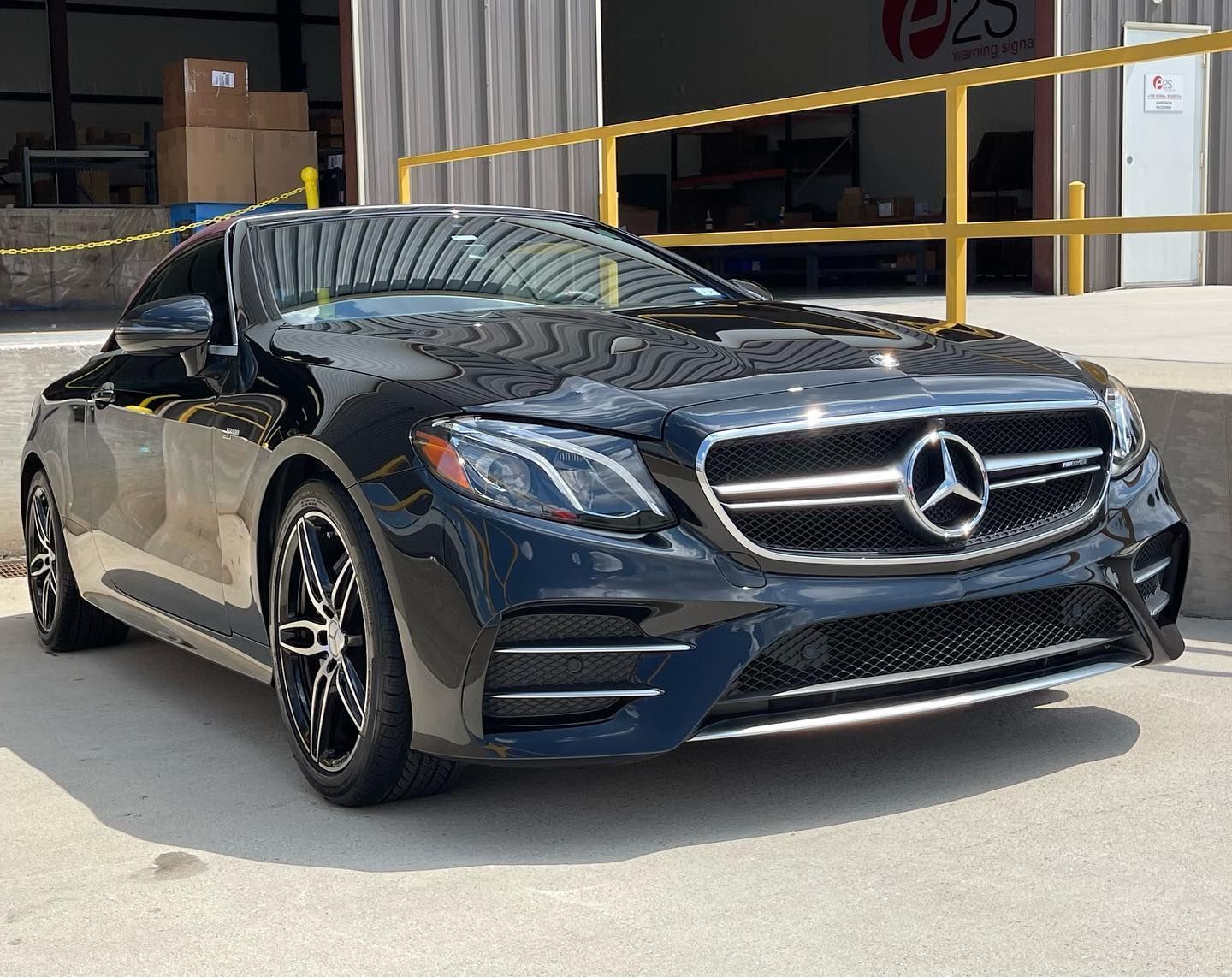 Black Benz under the sun