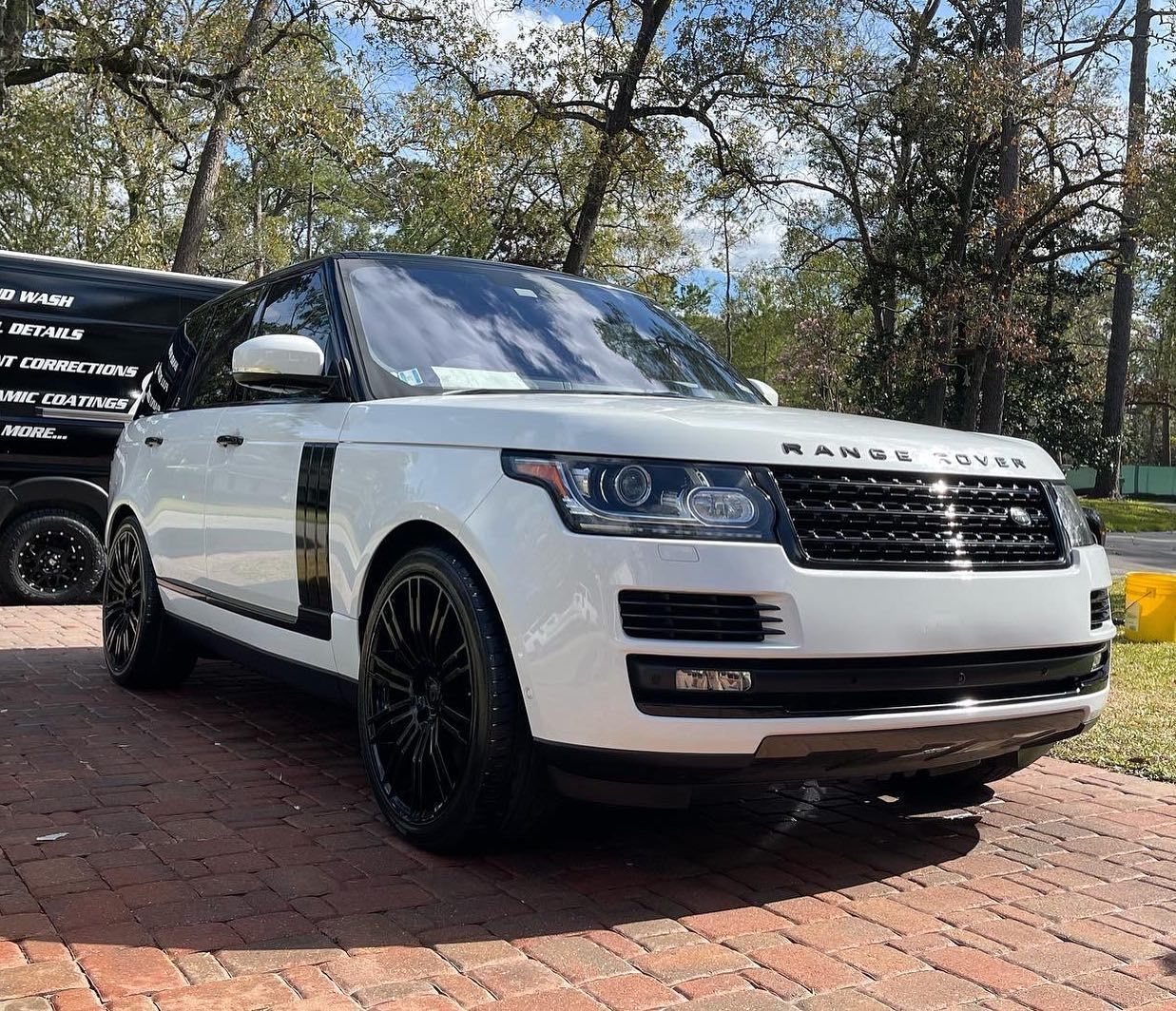 white ceramic coated Range Rover parked outside