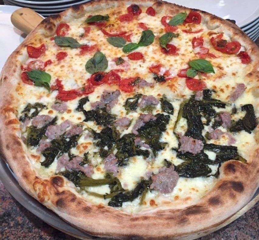 Pizza con condimento misto