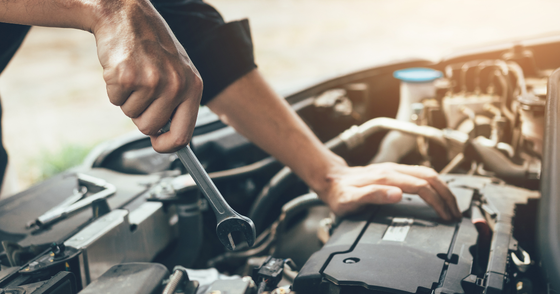 A mechanic doing a repair. 