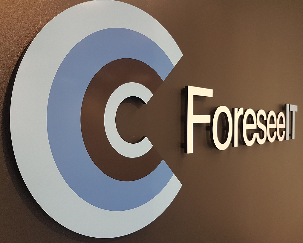A foreseell logo is on a brown wall A foreseell logo is on a brown wall