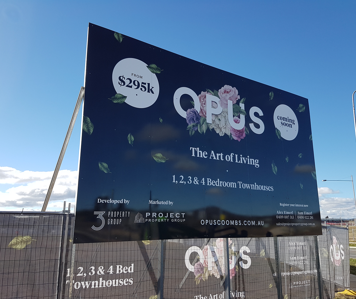 A large billboard with the word opus on it A large billboard with the word opus on it