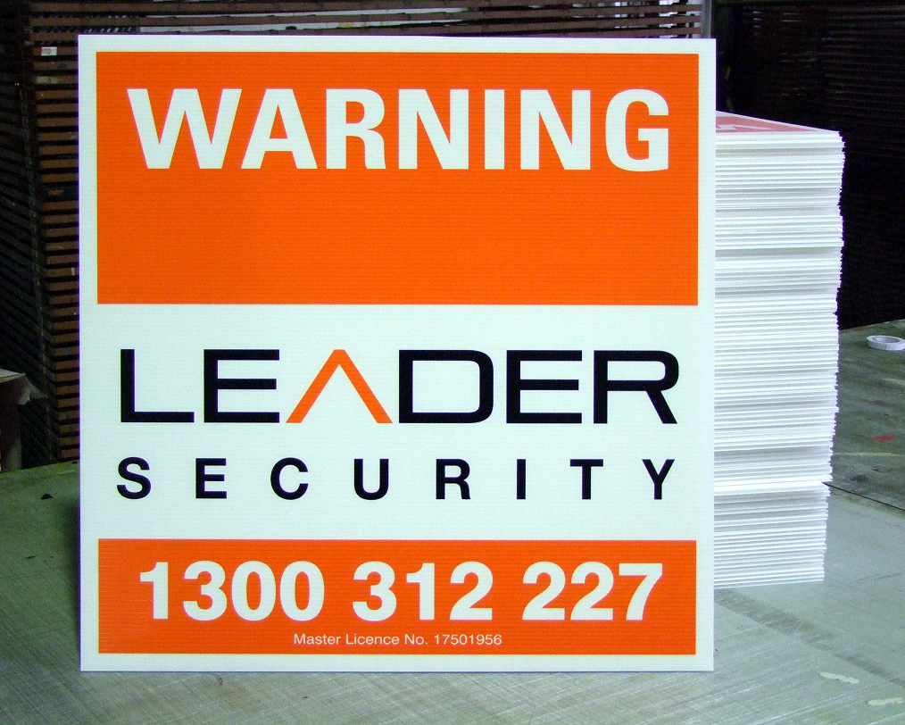 A sign that says warning leader security. A sign that says warning leader security.