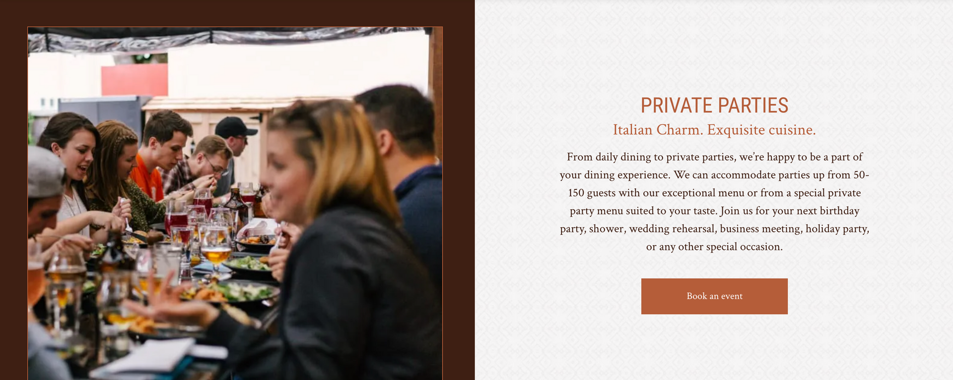 A group of people are sitting at a long table eating food.