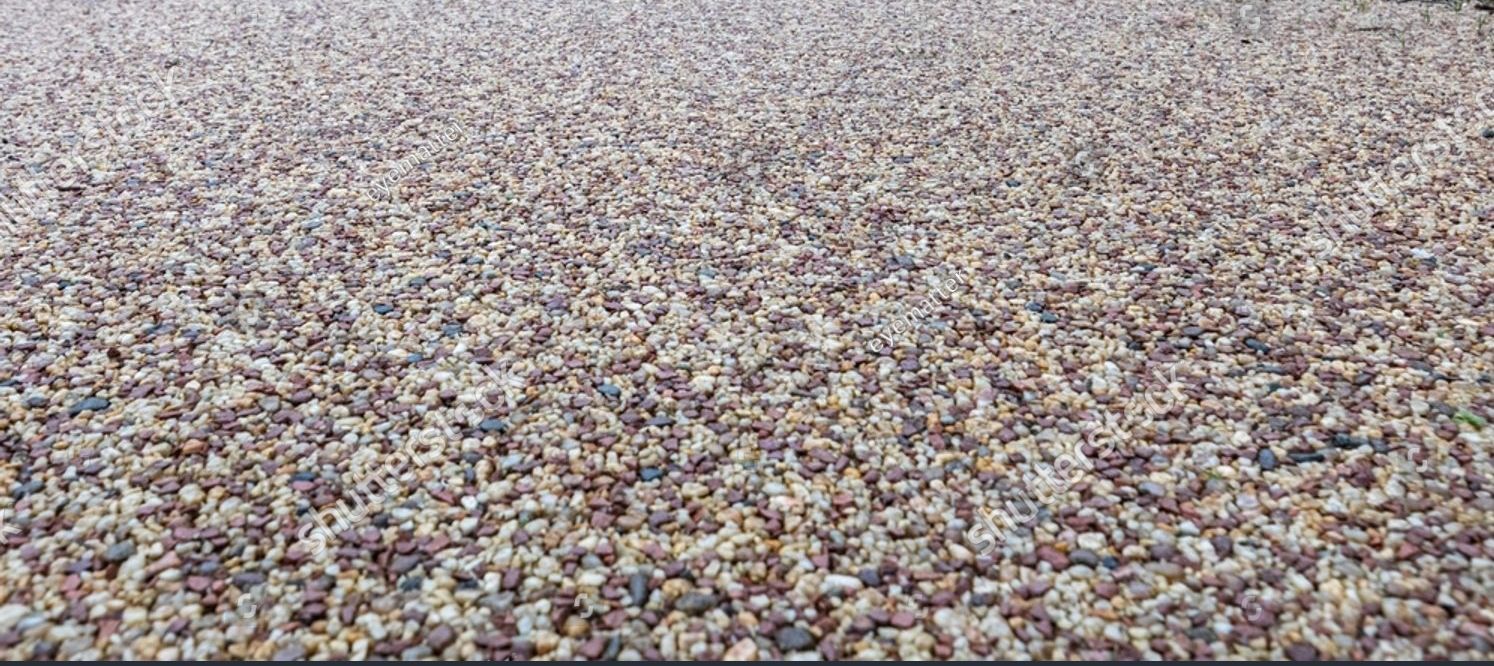 A close up of a pile of gravel on the ground.