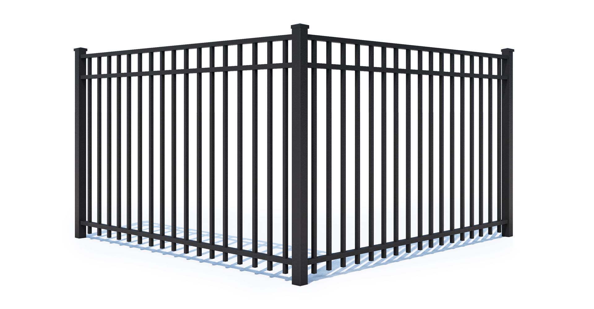 A black metal fence is sitting on top of a white surface.