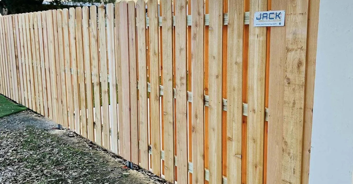 Wooden fence, natural wood color, with a