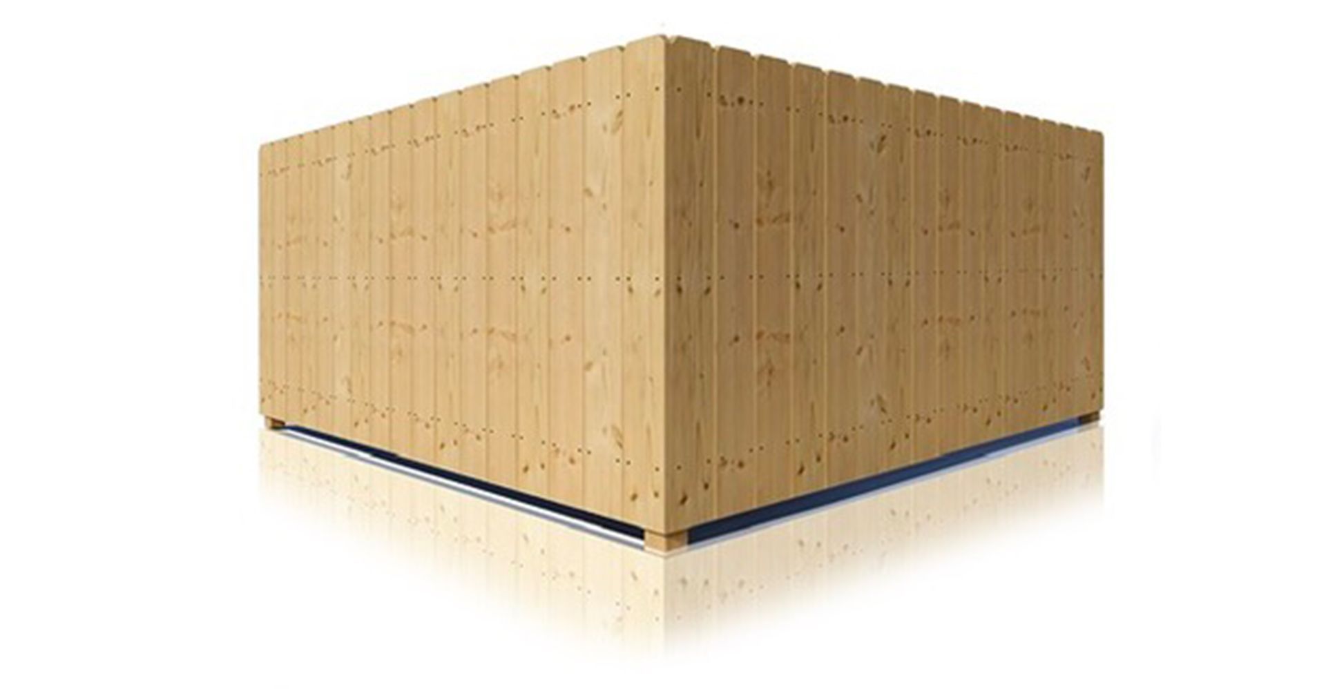 A wooden cube is sitting on a white surface.
