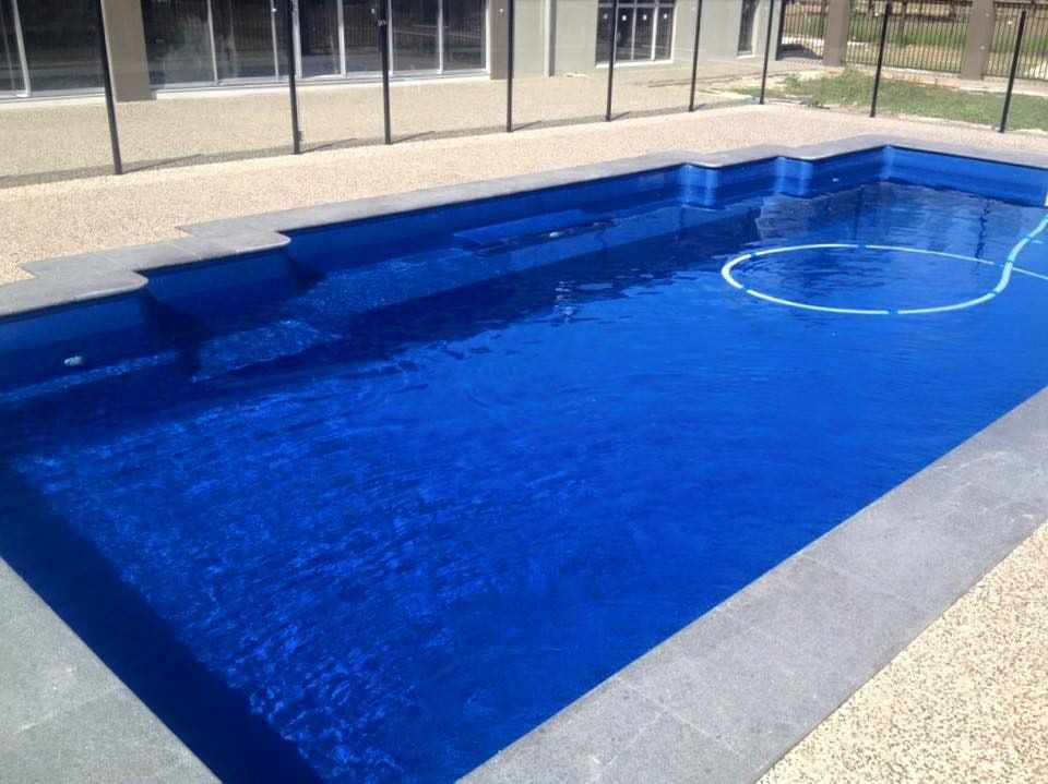 Rectangular Outdoor Swimming Pool With Clear Blue Water — Aqualine Pools in Branyan, QLD