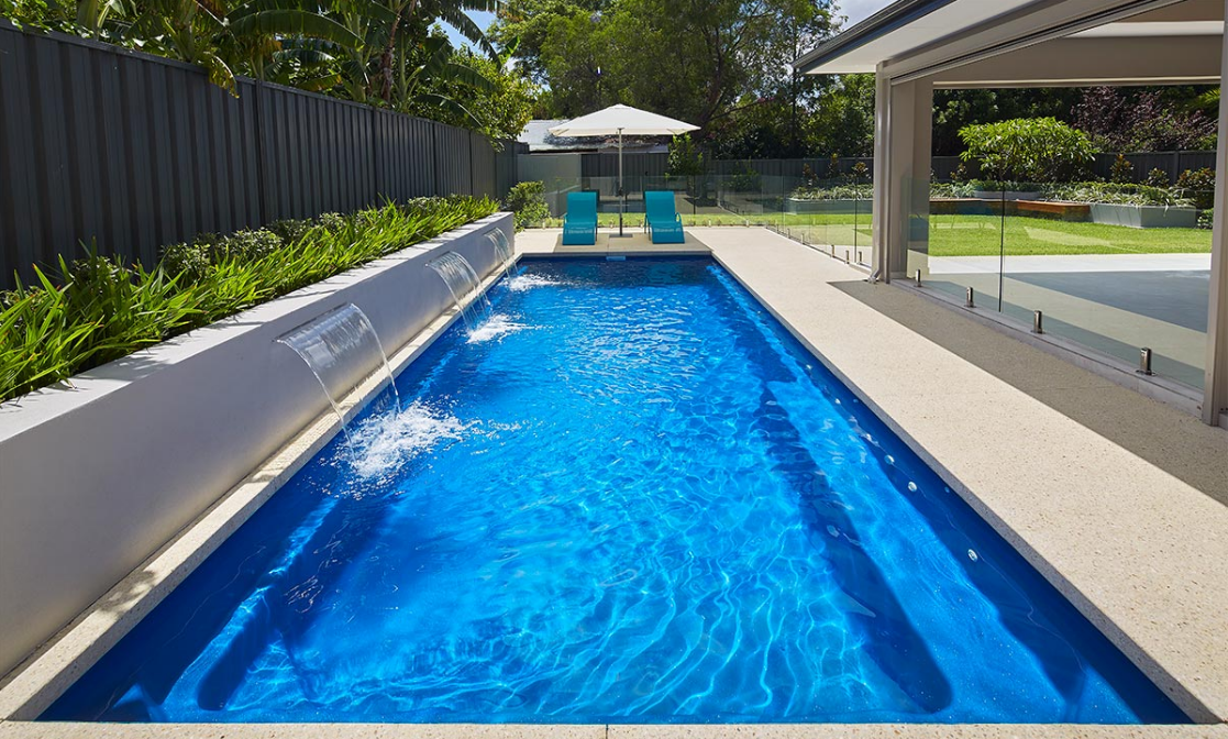 Long Pool Next To Fence — Aqualine Pools in Burnett Heads, QLD