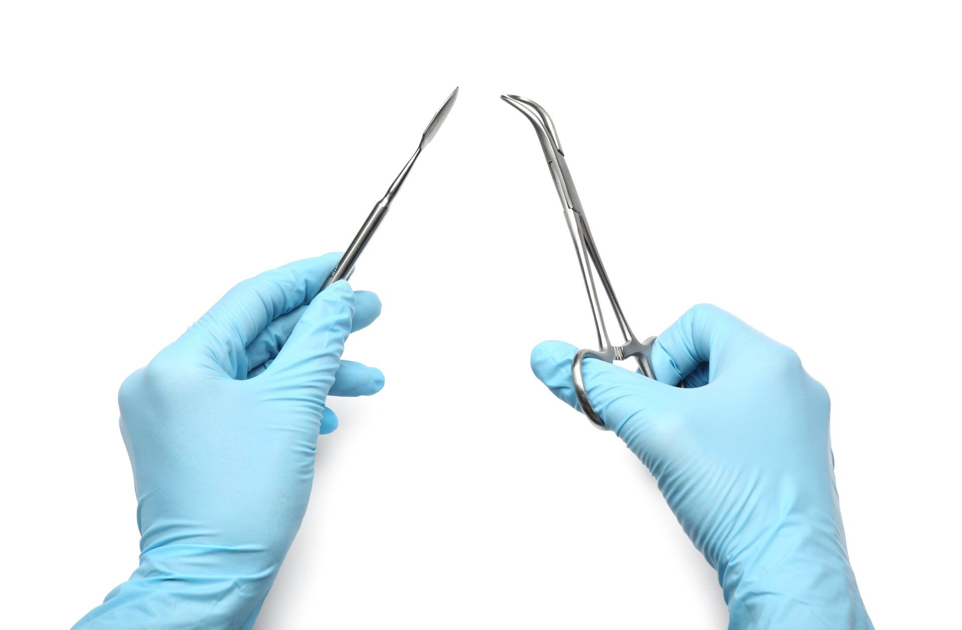 A person wearing blue gloves is holding a pair of scissors.