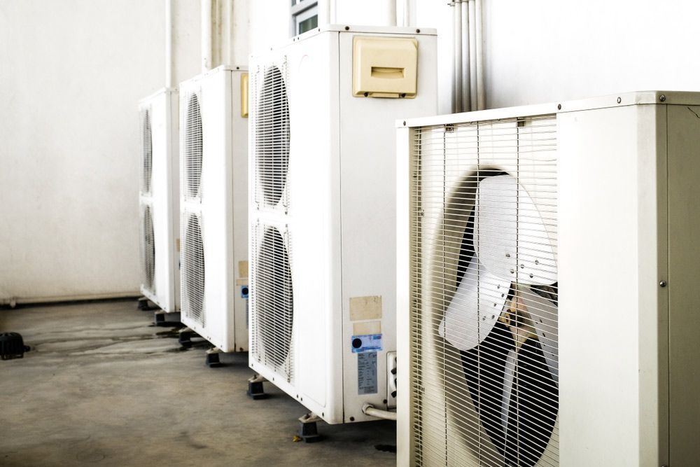 Row Of Air Conditioners Are Lined Up In A Room — Mingleford Electrical Airconditioning Solar & Gas In Kenilworth, QLD