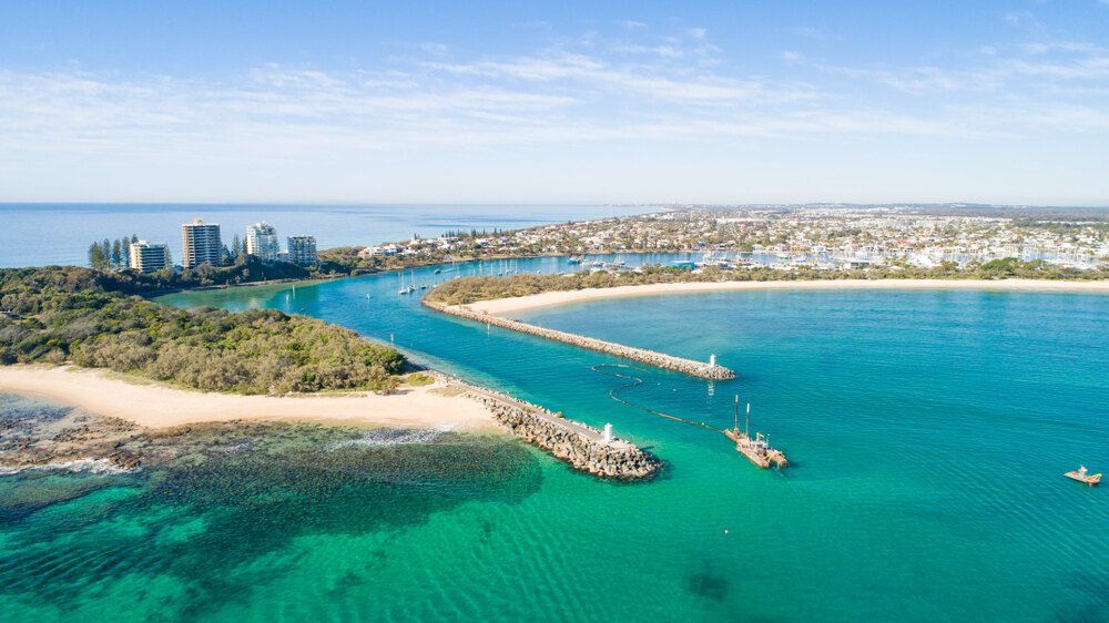 Aerial View Of A Body Of Water With A City In The Background — Mingleford Electrical Airconditioning Solar & Gas In Kilcoy, QLD