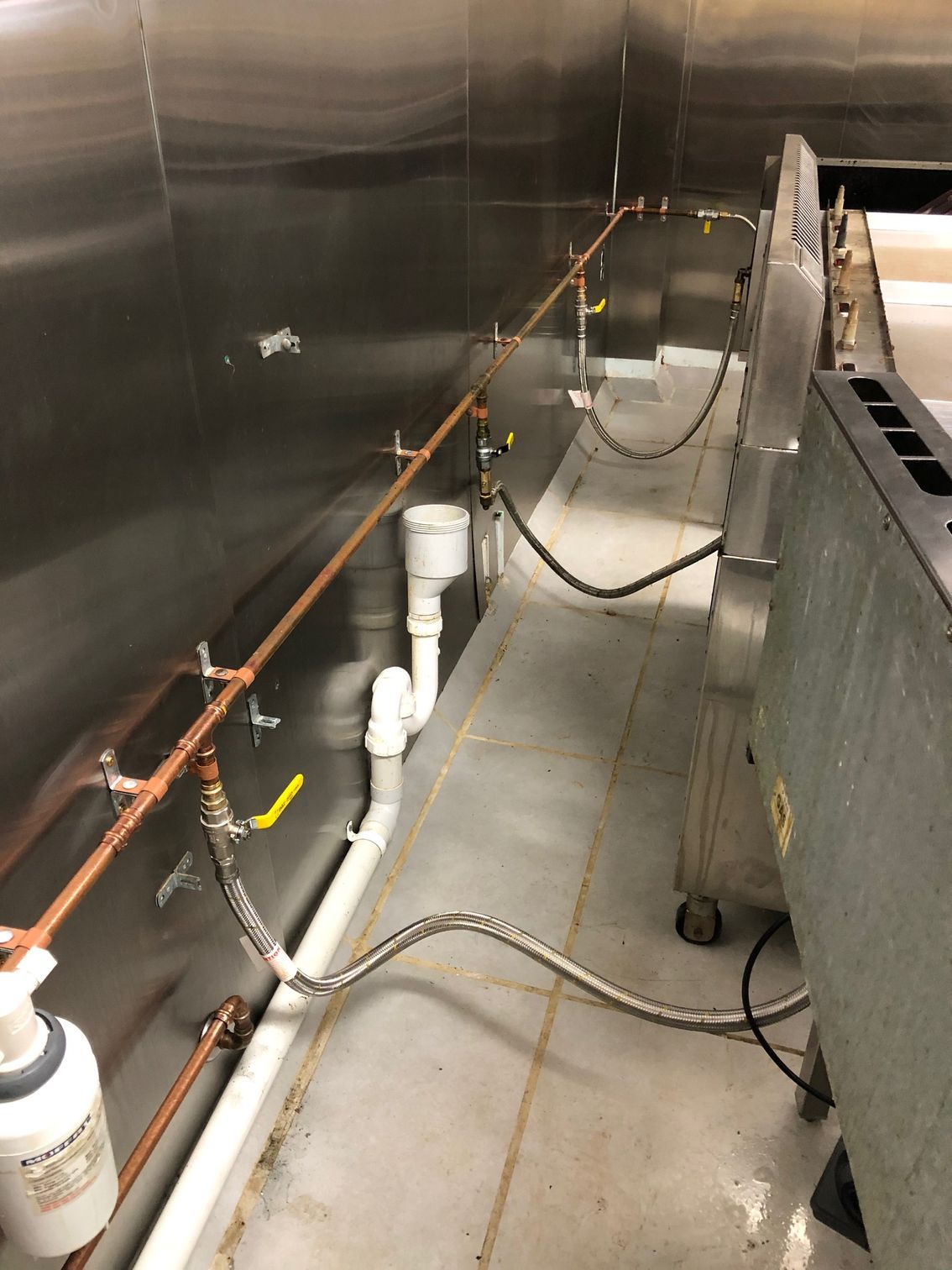 Man Repairing The Broken Washing Machine — Mingleford Electrical Airconditioning Solar & Gas In Landsborough, QLD