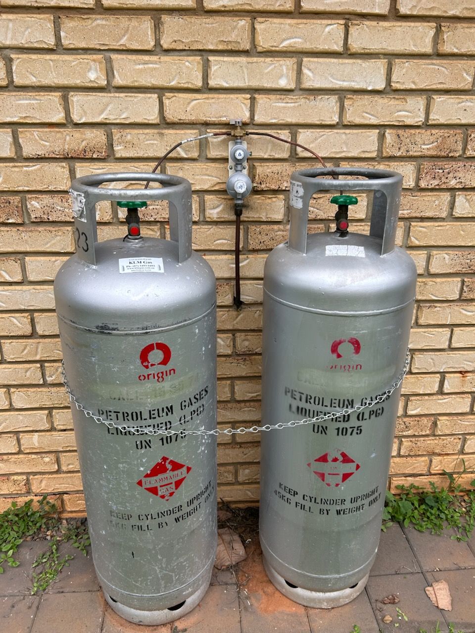 Man Installing A Gas Hob In a Kitchen — Mingleford Electrical Airconditioning Solar & Gas In Landsborough, QLD