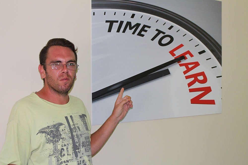 man-pointing-on-wall