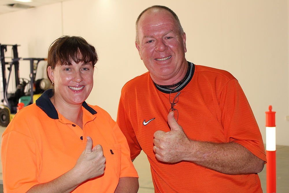 two-people-in-orange-shirt